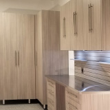 Utah-Wasatch-Garage-Promontory-maple-drawers-cabinets-epoxy-Stainless-Steel-countertop-LED-light-shines