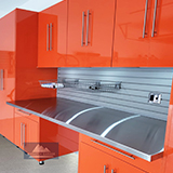 Utah-Wasatch-Garage-orange-storeWALL-workbenches-Stainless-Steel-baskets-metal-Cabinets-coat-epoxy-flooring