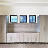 Utah-Wasatch-Garage-cabinets-gray-epoxy-floor-countertop-windows-Promontory-Luxury