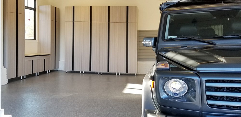 garage-almond-cabinets-epoxy-floor-car