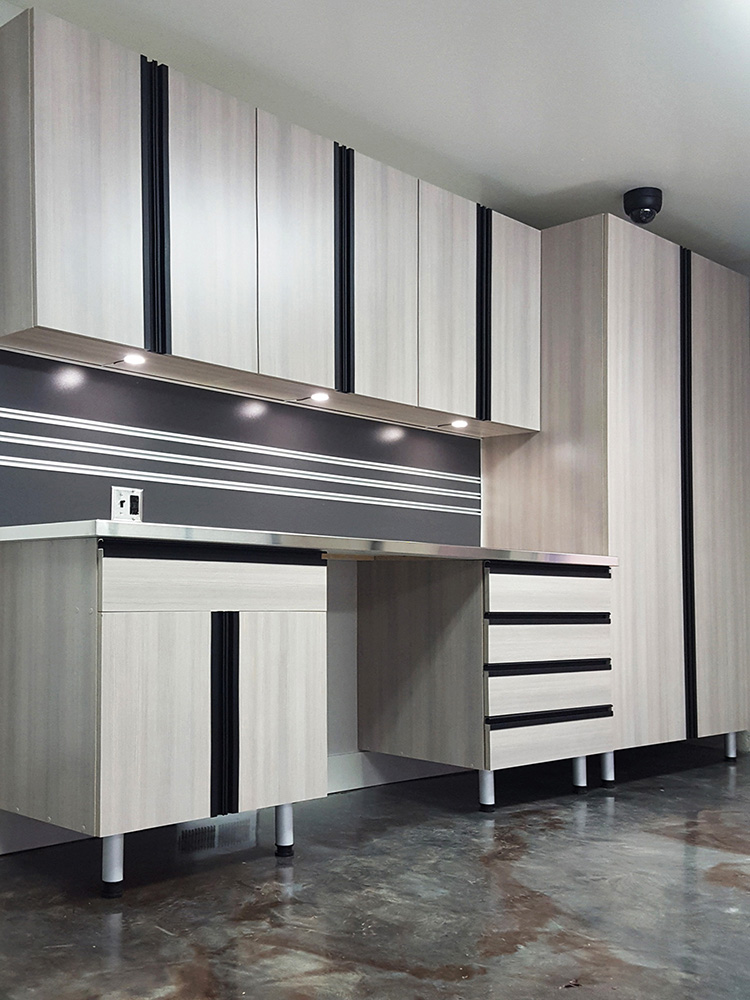 garage-cabinets-lighting-steel-countertop-lava-metallic-floor