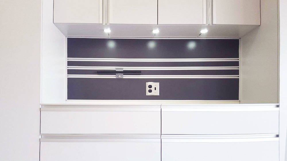 garage-white-lighting-cabinetry