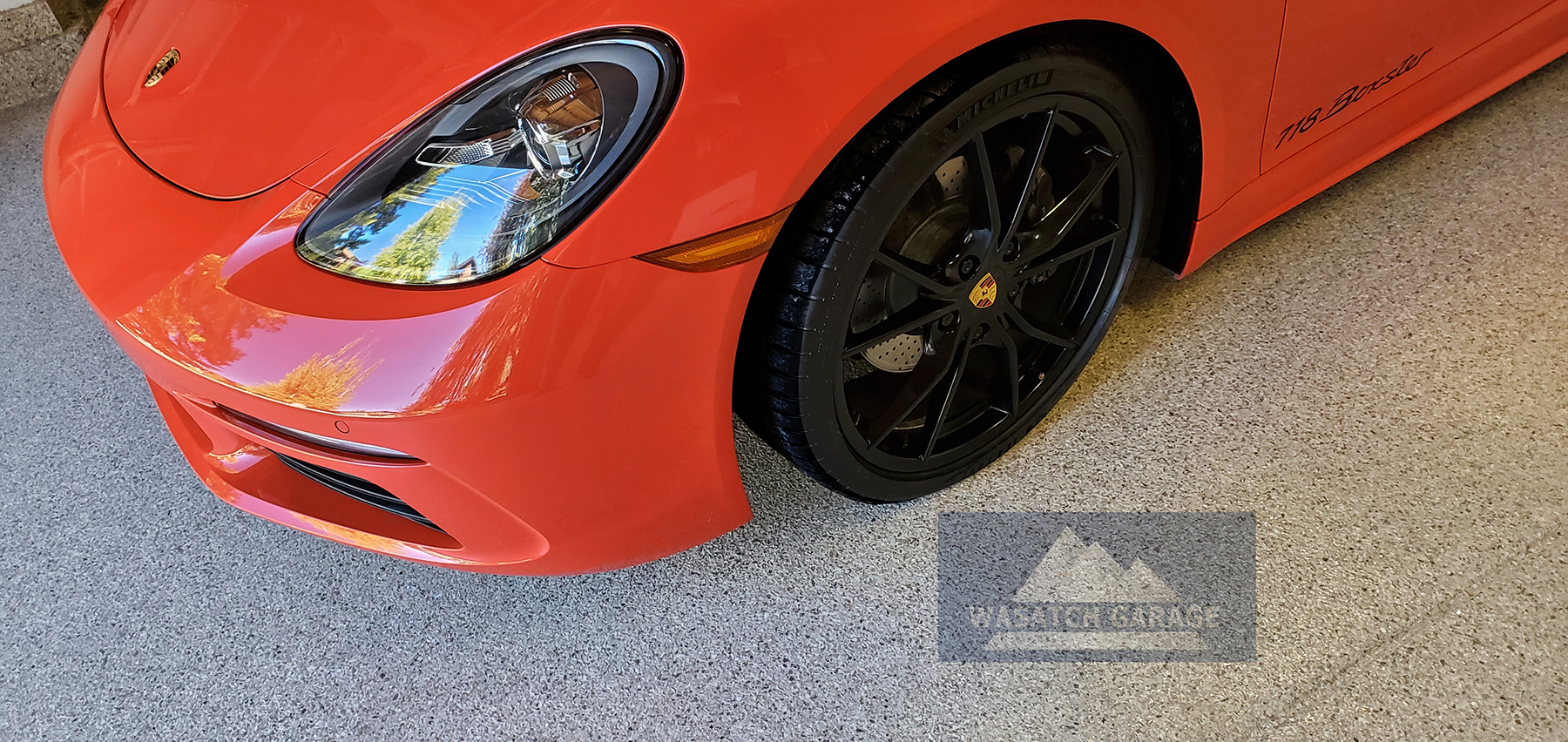 Park-City-Wasatch-Garage-Utah-Garage-floor-Luxury-Ferrari-supercar-orange