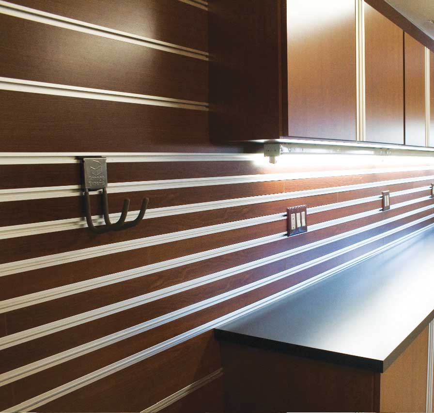 garage-brown-cabinets-lighting-countertop