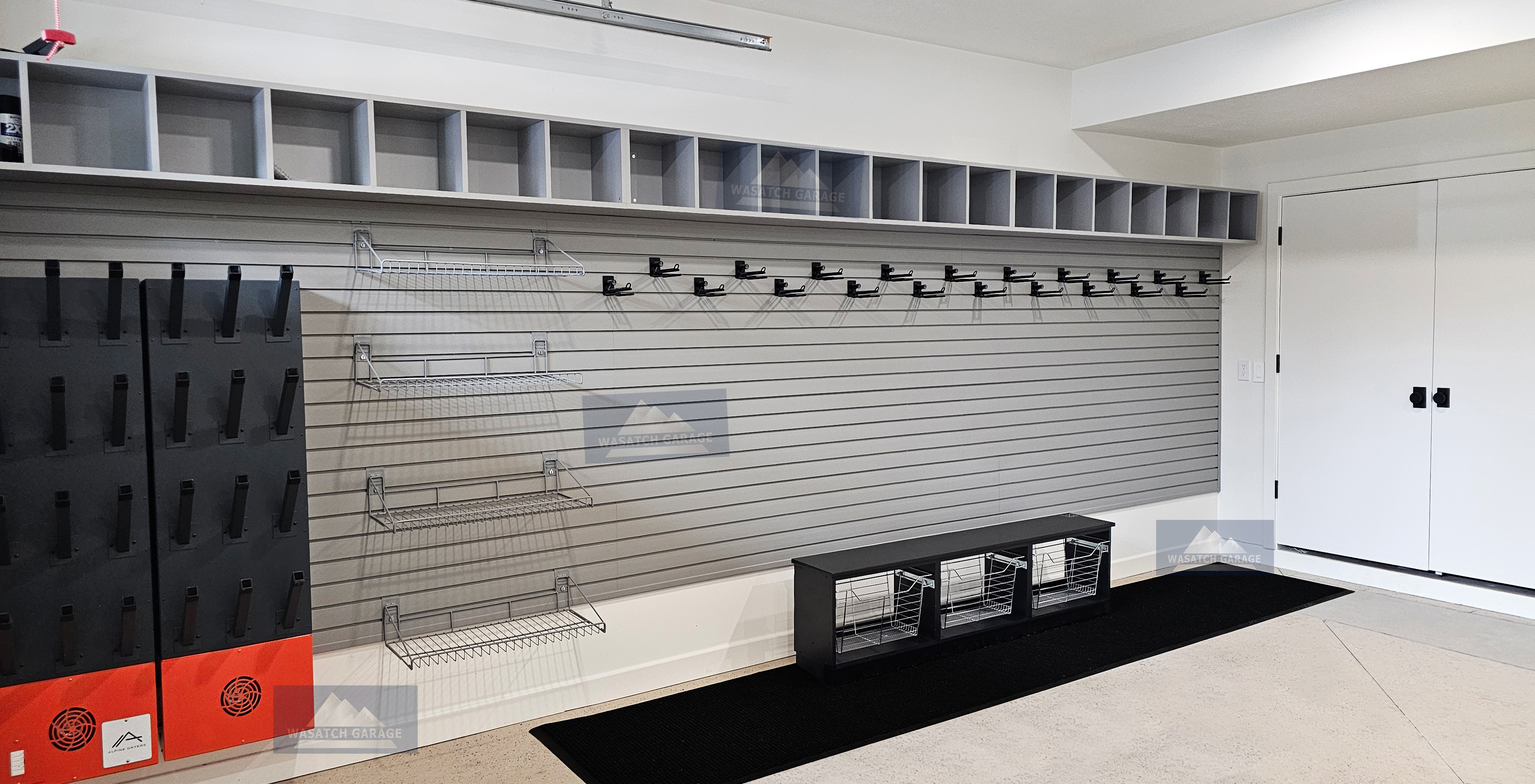 Wasatch-Garage-Utah-Garage-grey-bench-wood-Luxury-epoxy-Cabinets-bike-ski