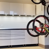 Utah-Promontory-Wasatch-garage-white-metal-cabinets-Stainless-Steel-countertop-bike-storage