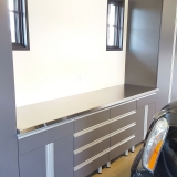 Utah-Wasatch-garage-window-Stainless-Steel-countertop-wood-cabinets-Drawer-metallic-flooring-woodshop