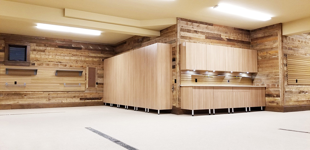 garage-epoxy-wood-cabinetry-wood-wall-lighting