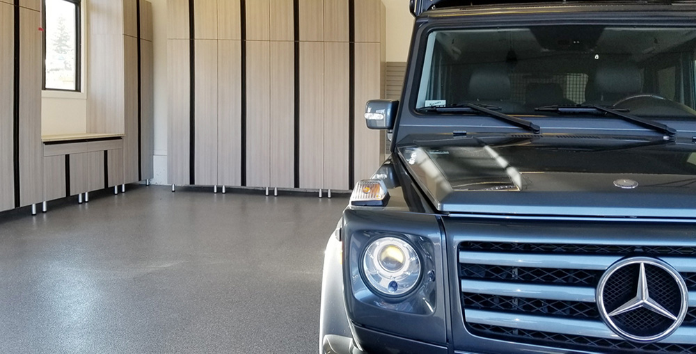 Utah-garage-almond-cabinets-epoxy-flooring-car