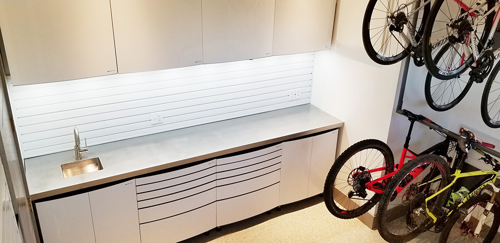 garage-chrome-sink-cabinests-bicycles
